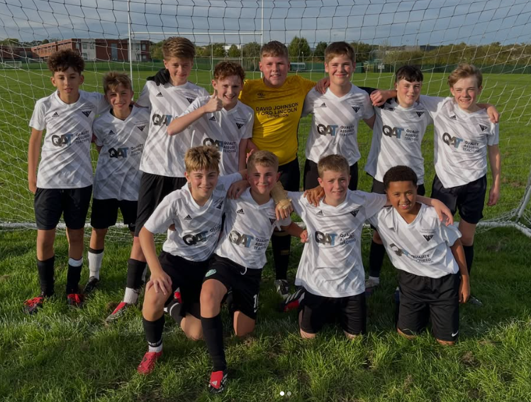 players pose for team photo