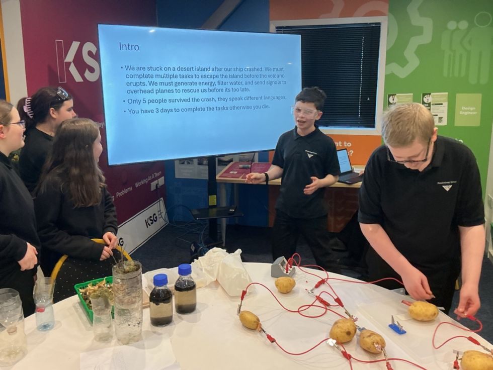 y8 students demonstrate science experiments at a competition