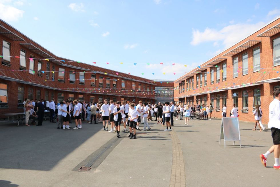 students outside with coloured bunting