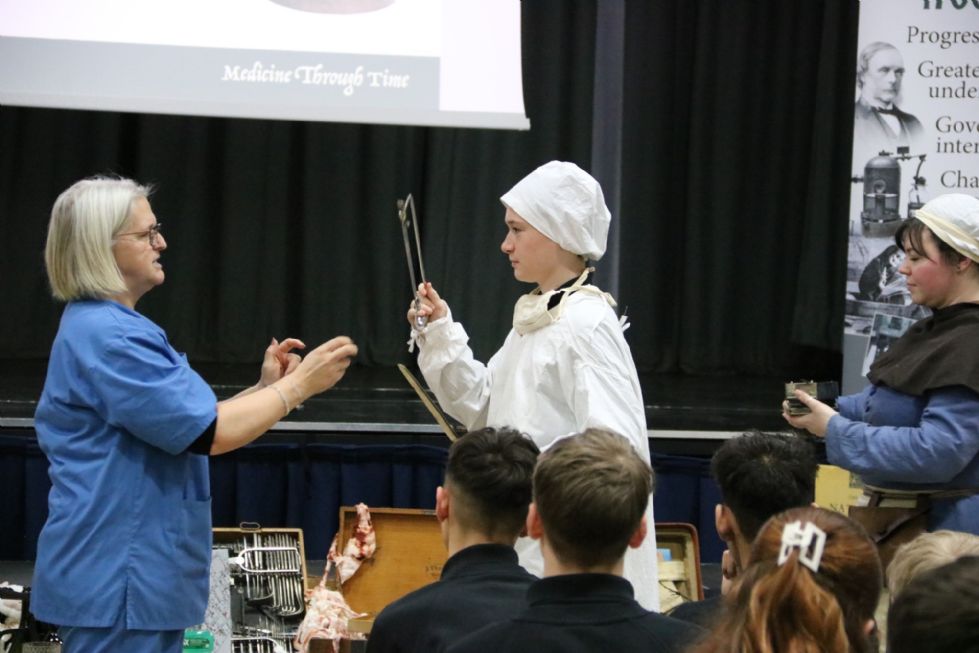 y10 students take place in history workshop