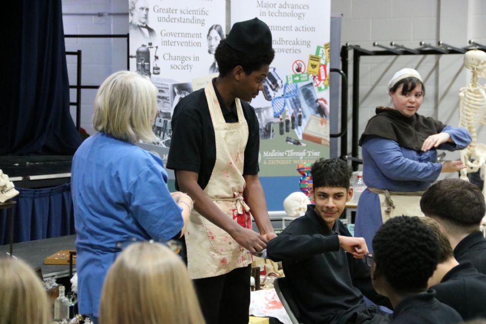 y10 students take place in history workshop