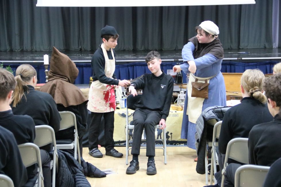 y10 students take place in history workshop
