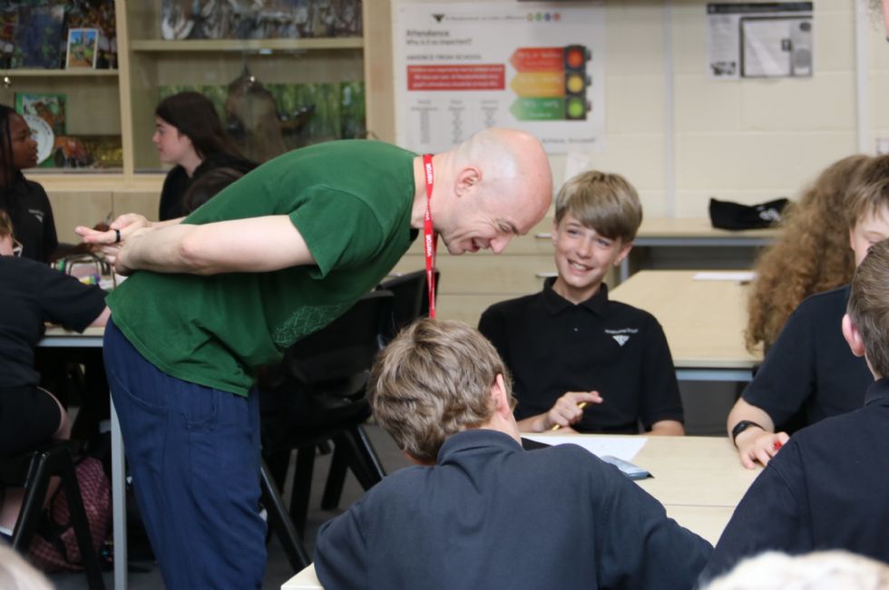 poet with students in a workshop