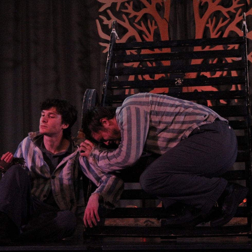 actors on stage in the play voices of the holocaust