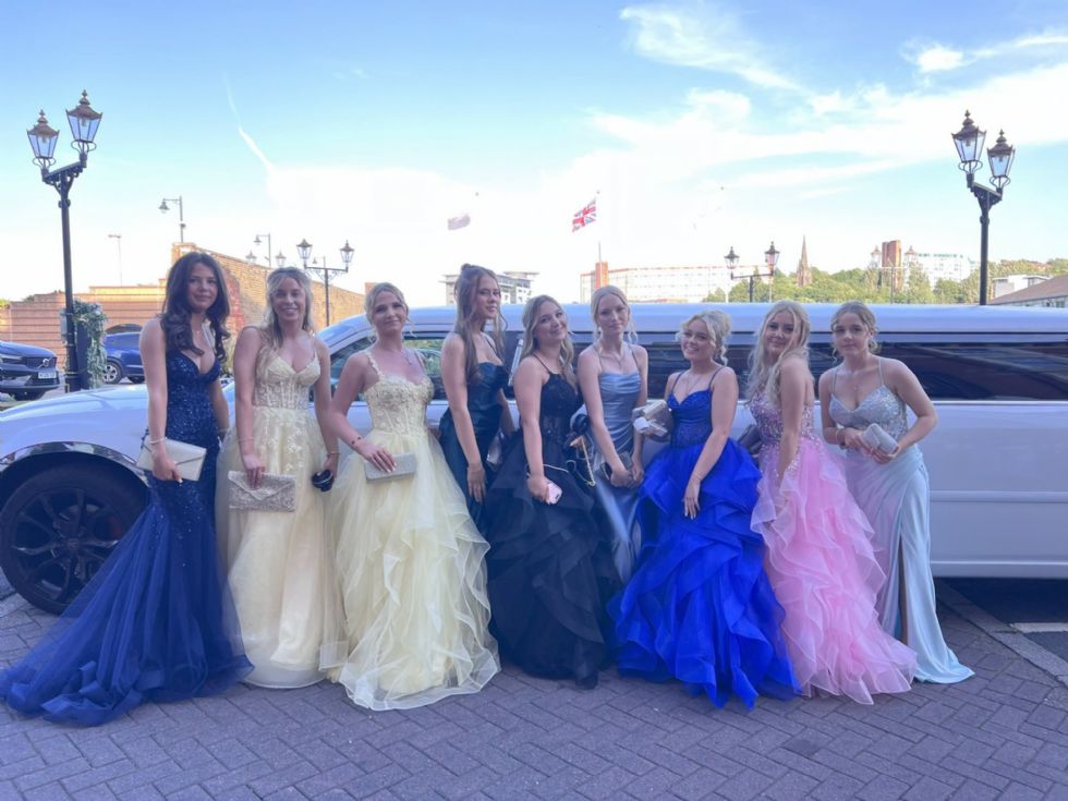 group of girls dressed in prom dresses