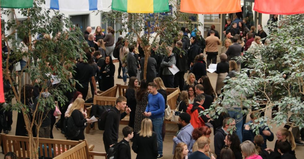 parents, guardians, students and staff mingle in the Rosling