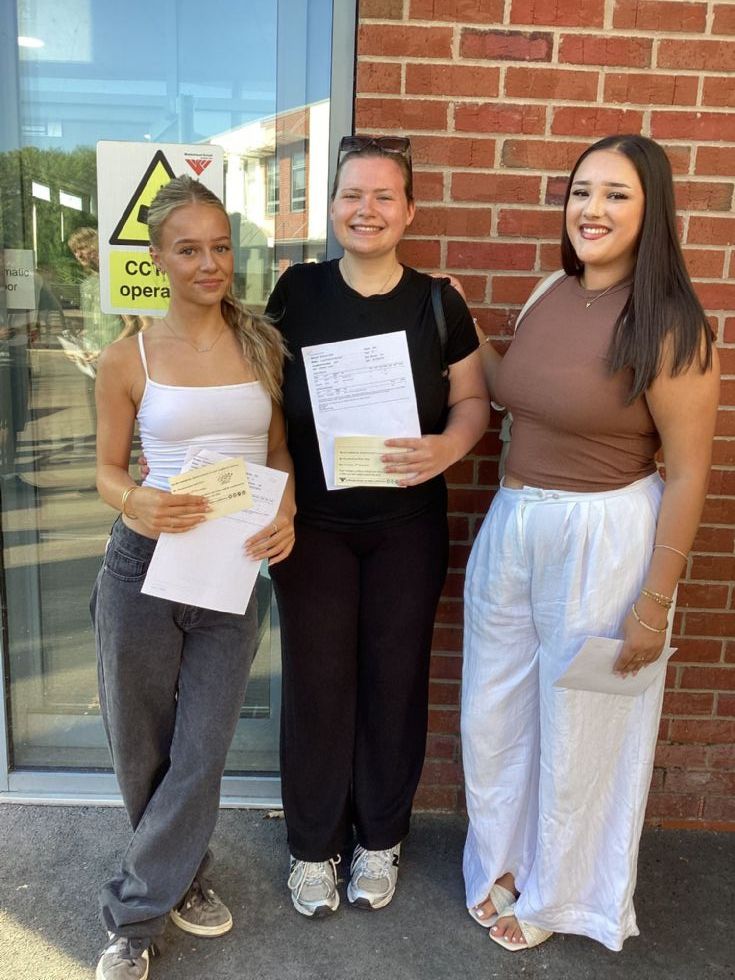 sixth form students with their a level results