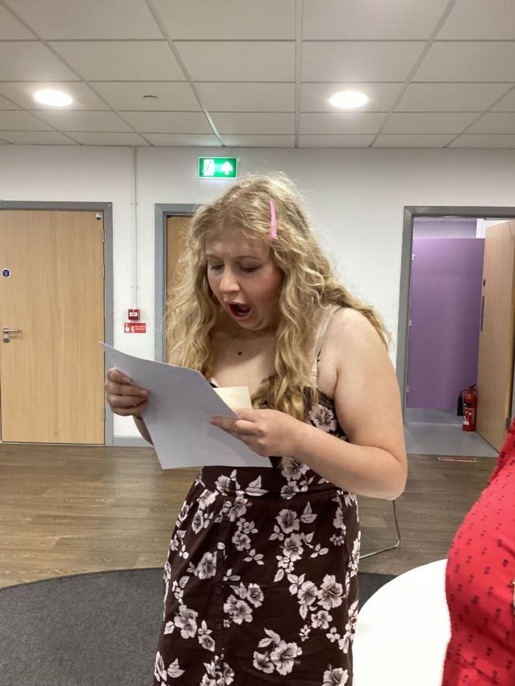 sixth form student with their a level results