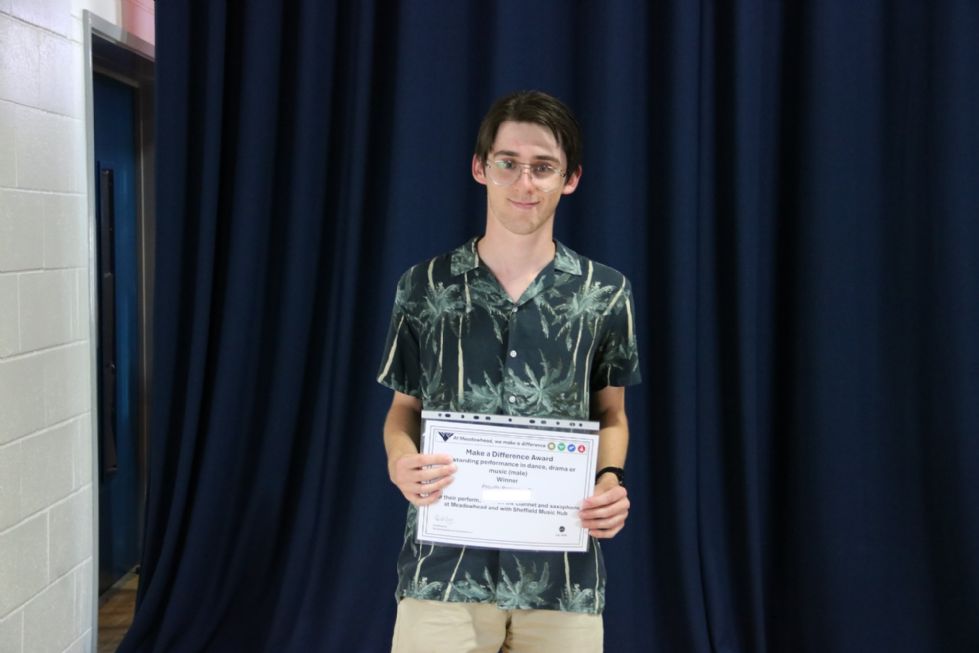 students with their award certificate