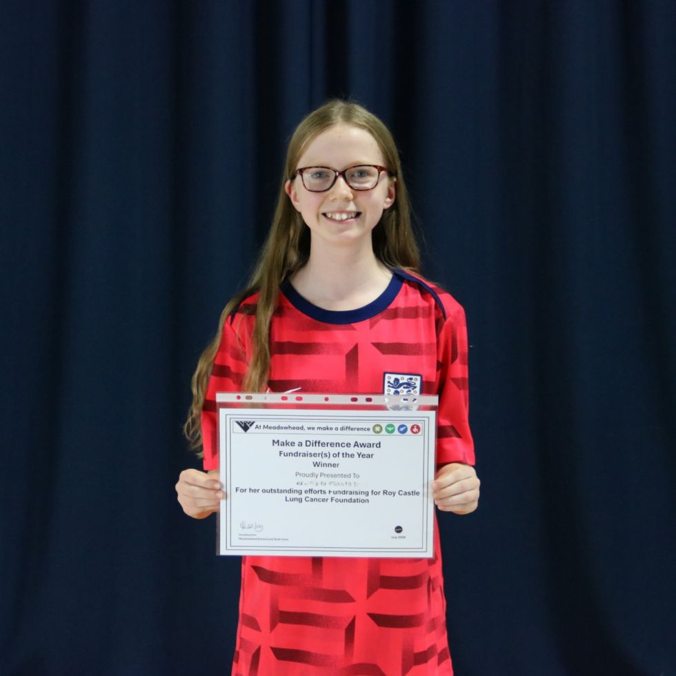 student with certificate at awards evening