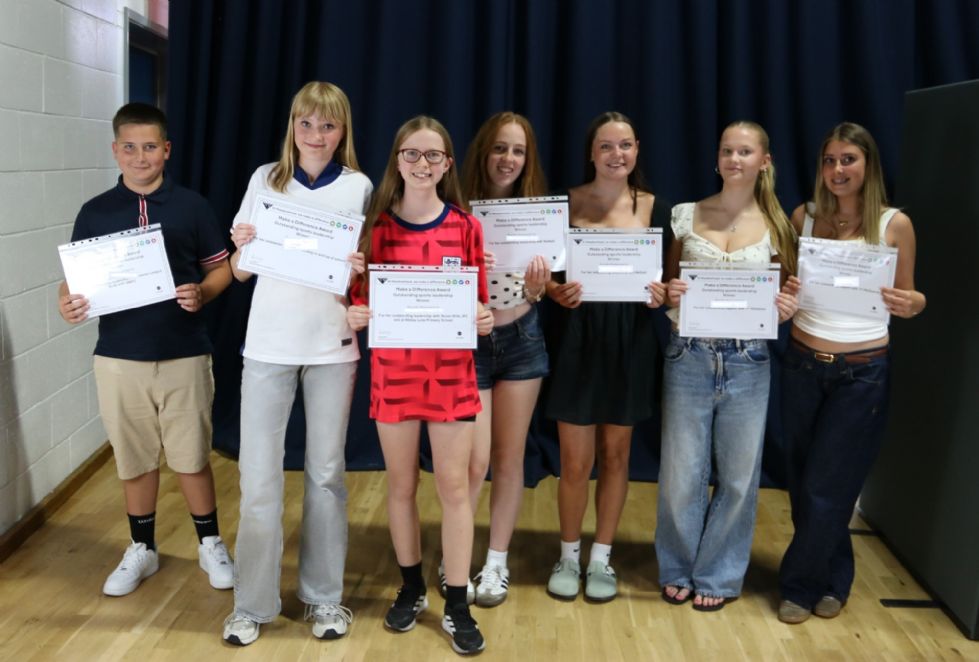 students  with their certificates at awards evening