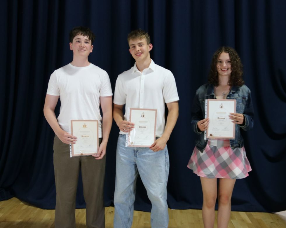 students  with their certificates at awards evening