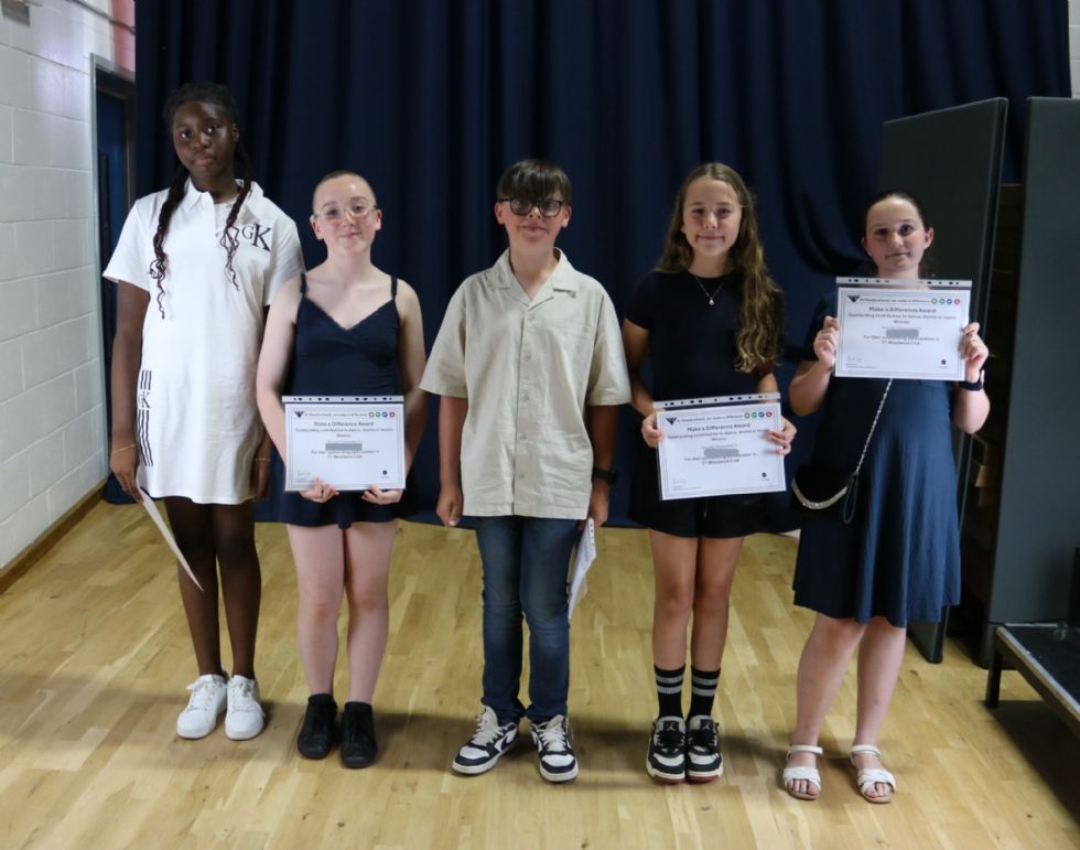students with their award certificate