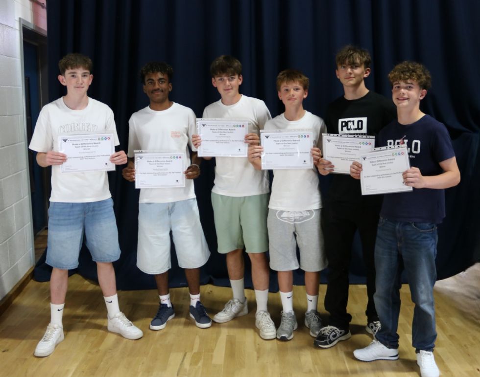 students with their award certificate