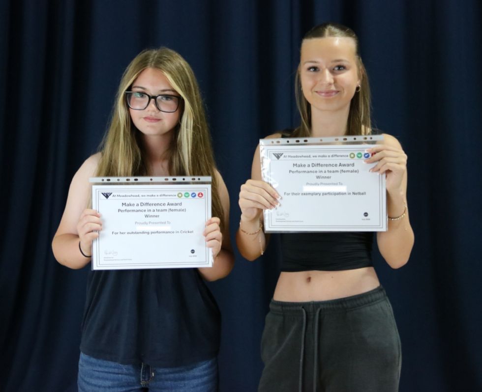 students with their award certificate