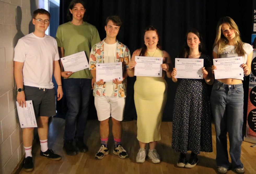 students with their make a difference awards