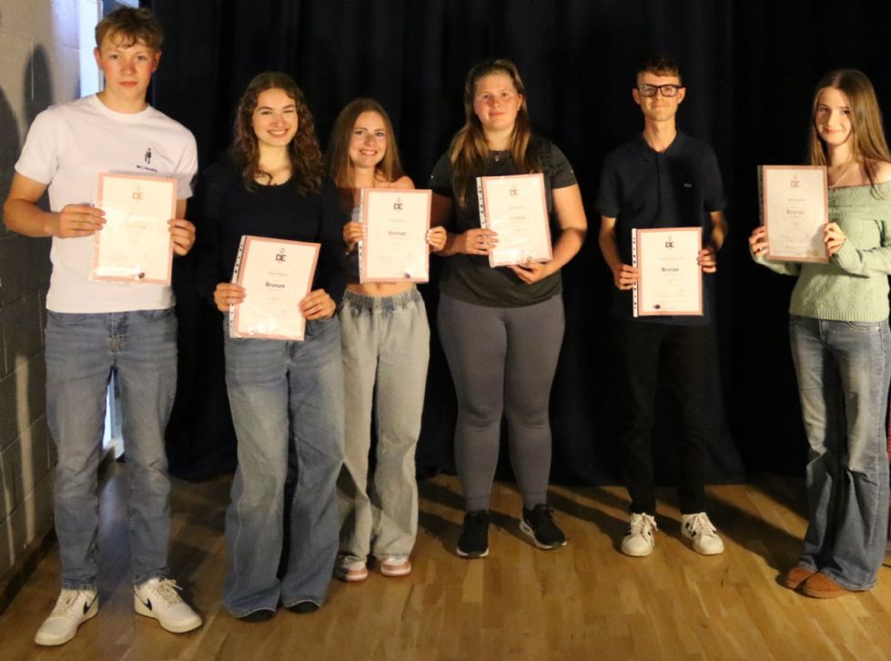students with their make a difference awards
