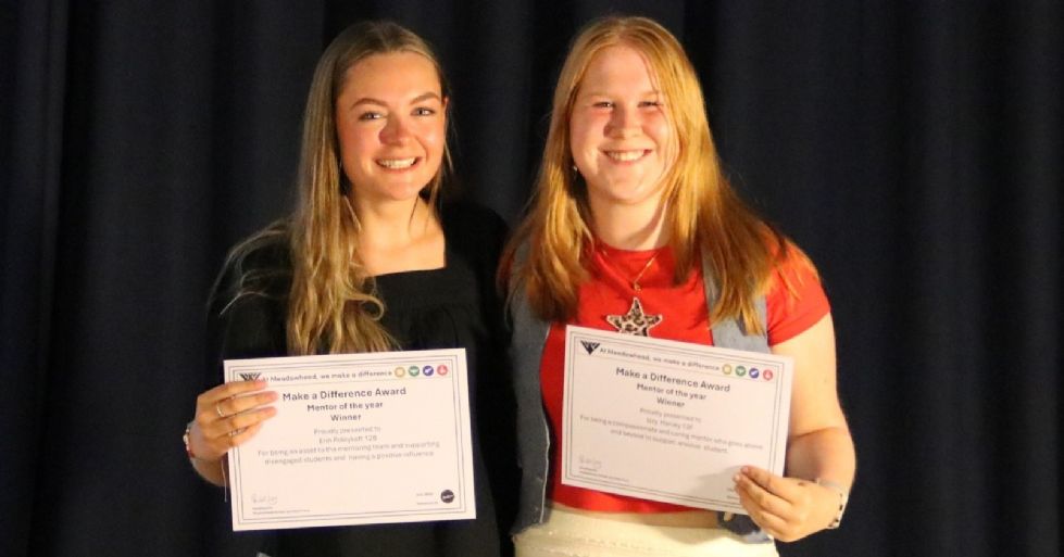 student with their make a difference award