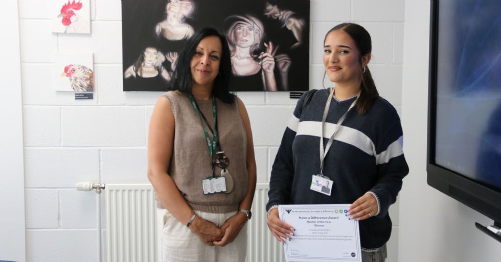 student with their make a difference award