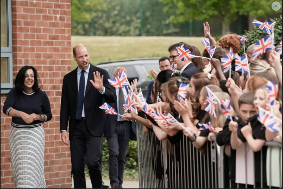 Prince William arrives at Meadowhead school