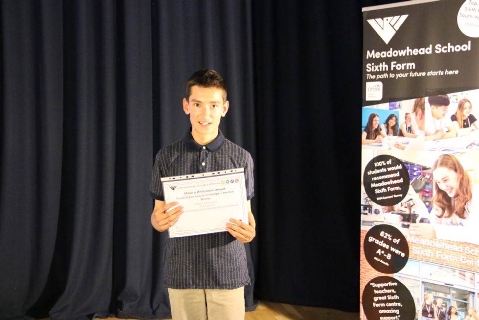 student with their make a difference award