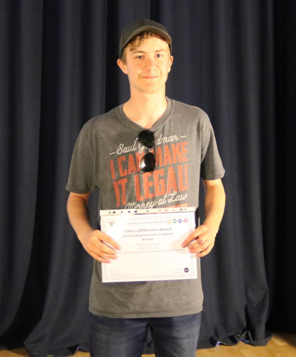 student with their make a difference award