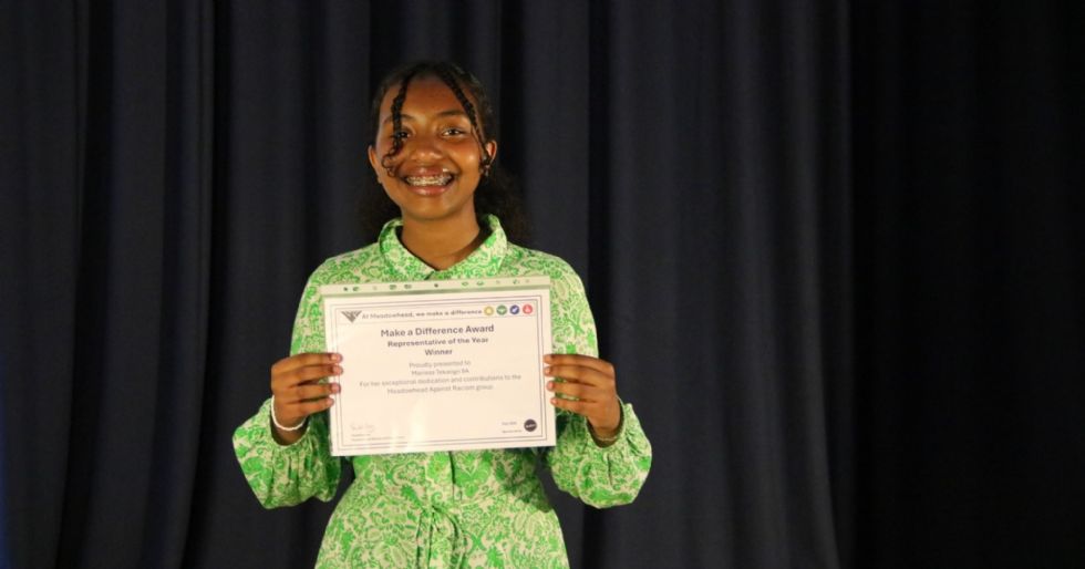 student with their make a difference award