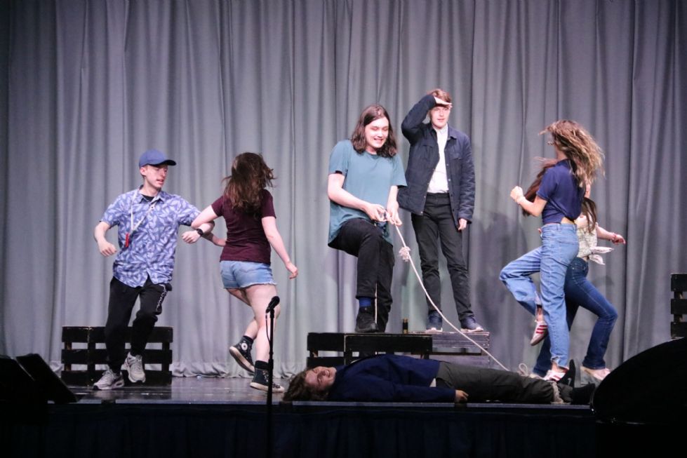 sixth form students perform sea shanty