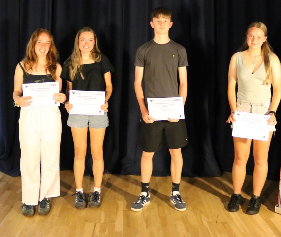 students with their make a difference awards