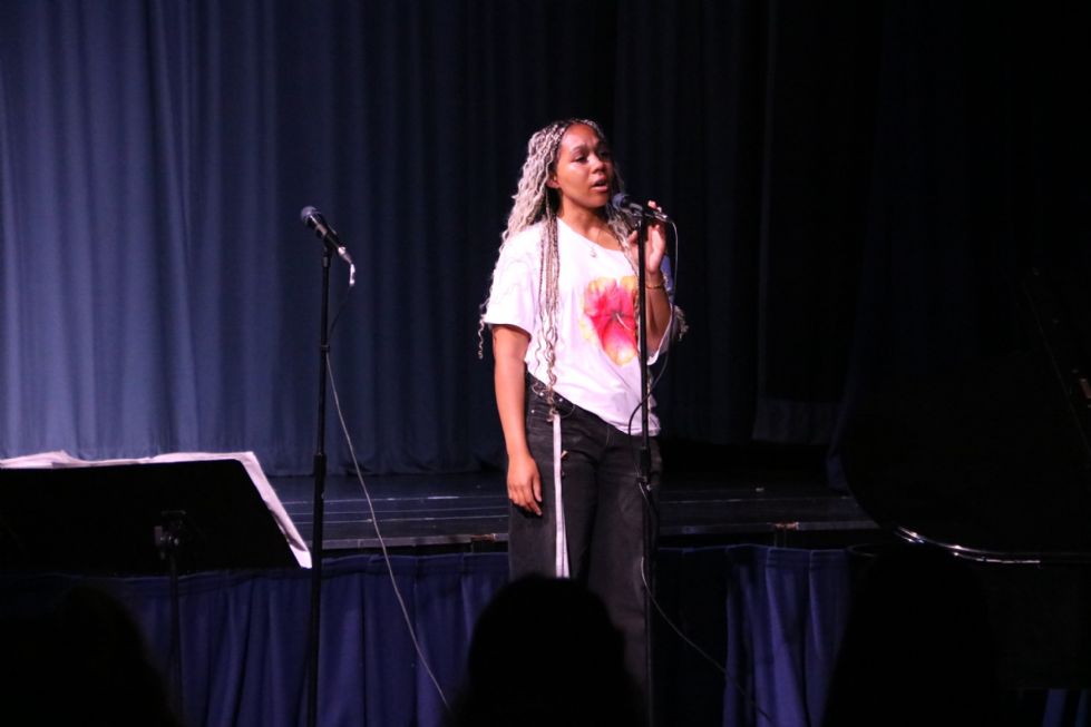 student singing at performance showcase