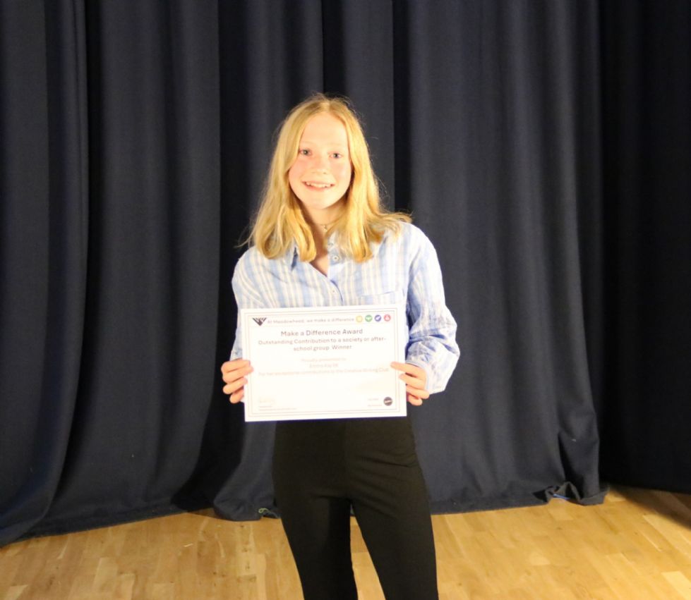 student with their make a difference award