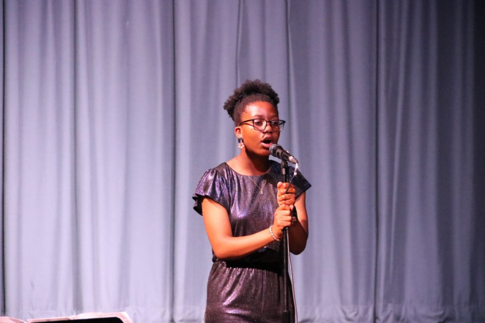 student sings