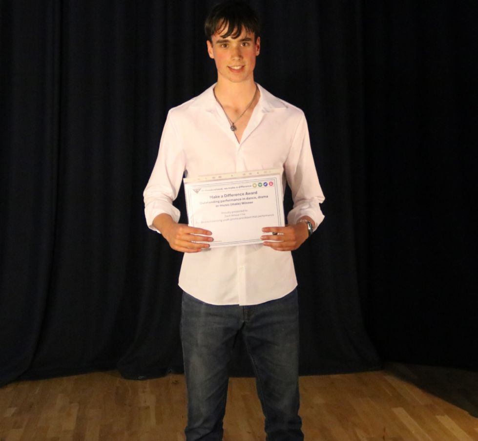 student with their make a difference award