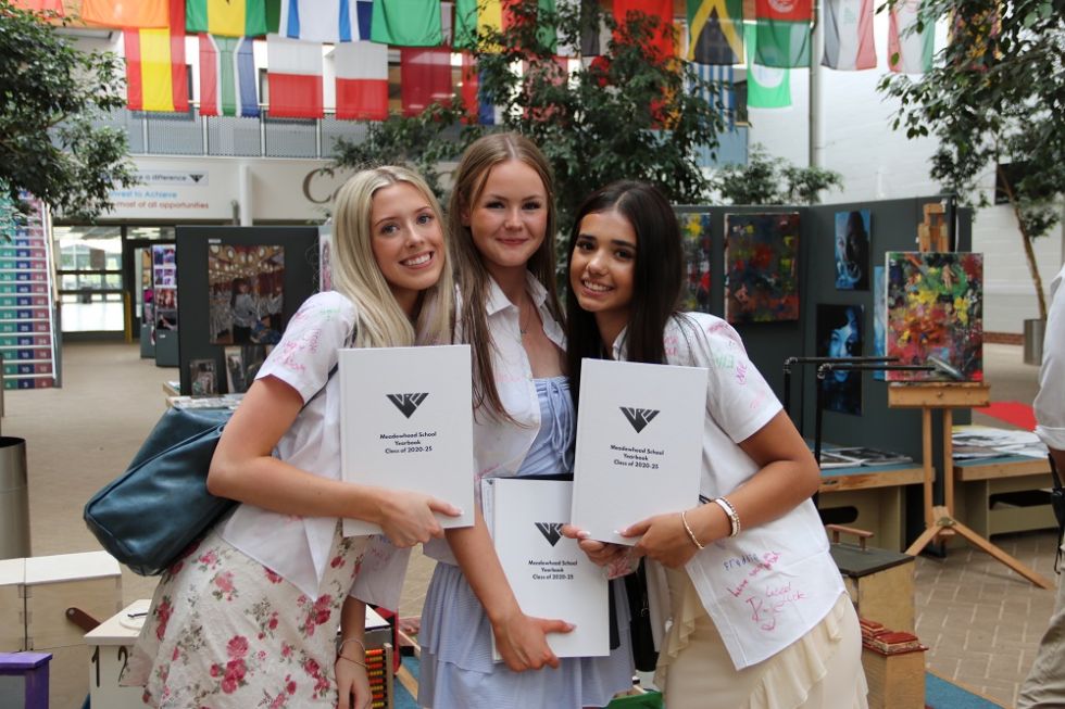 Y11s in the rosling with their year books