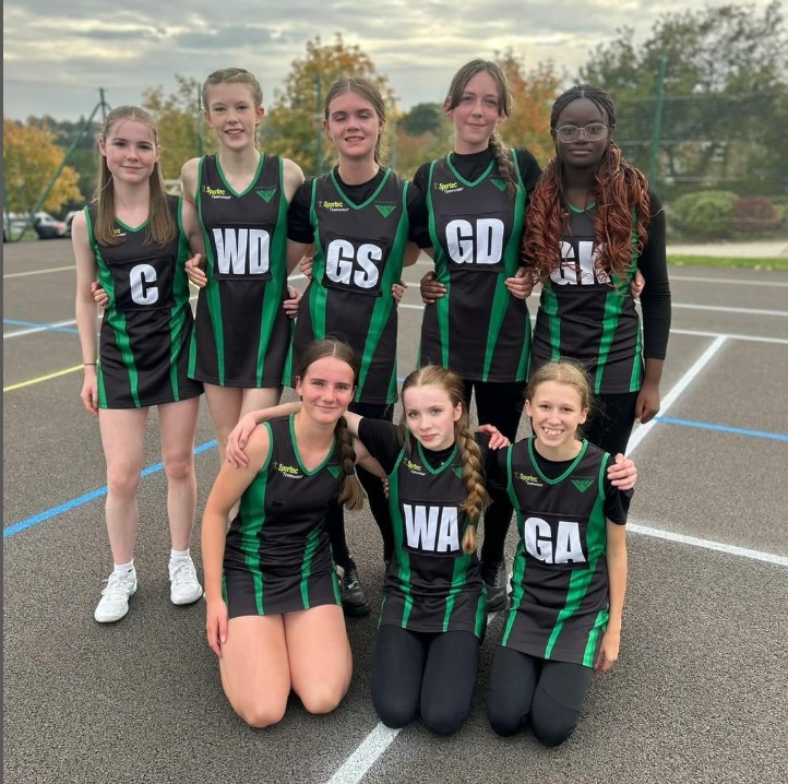 u15s netball team pose for photo
