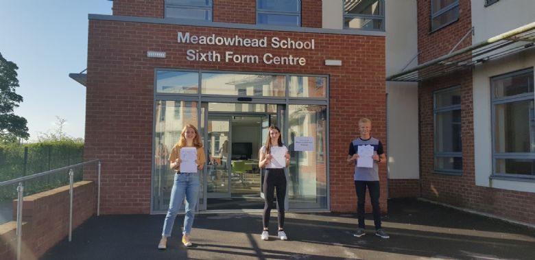 3 students receive their results