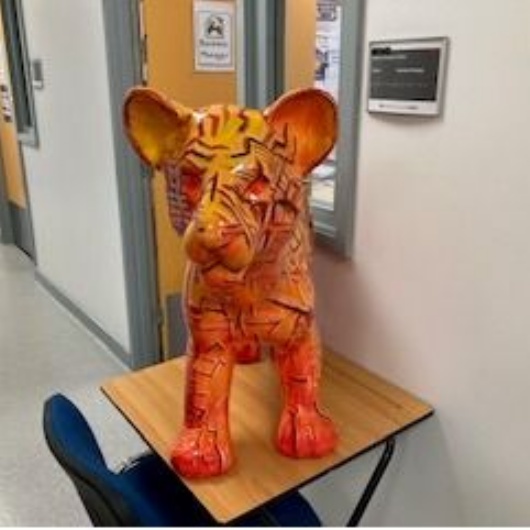 statue of lion cub decorated by our art department