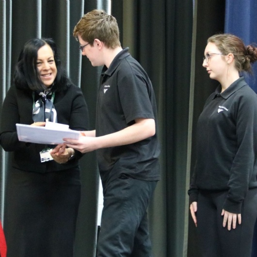 the headteacher presents the awards