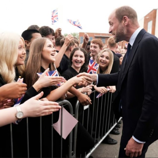 His Royal Highness the Prince of Wales greets pupils at Meadowhead school