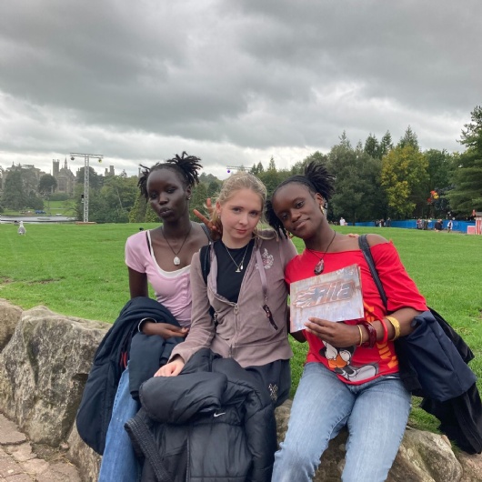 3 students pose for a photo enjoying their trip to Alton Towers