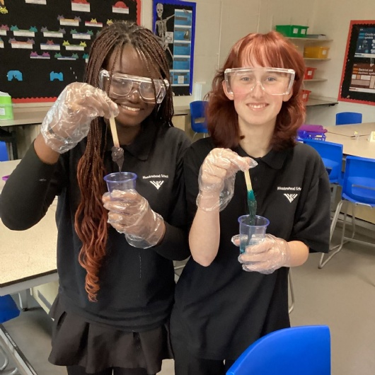 stem club students make magnetic slime